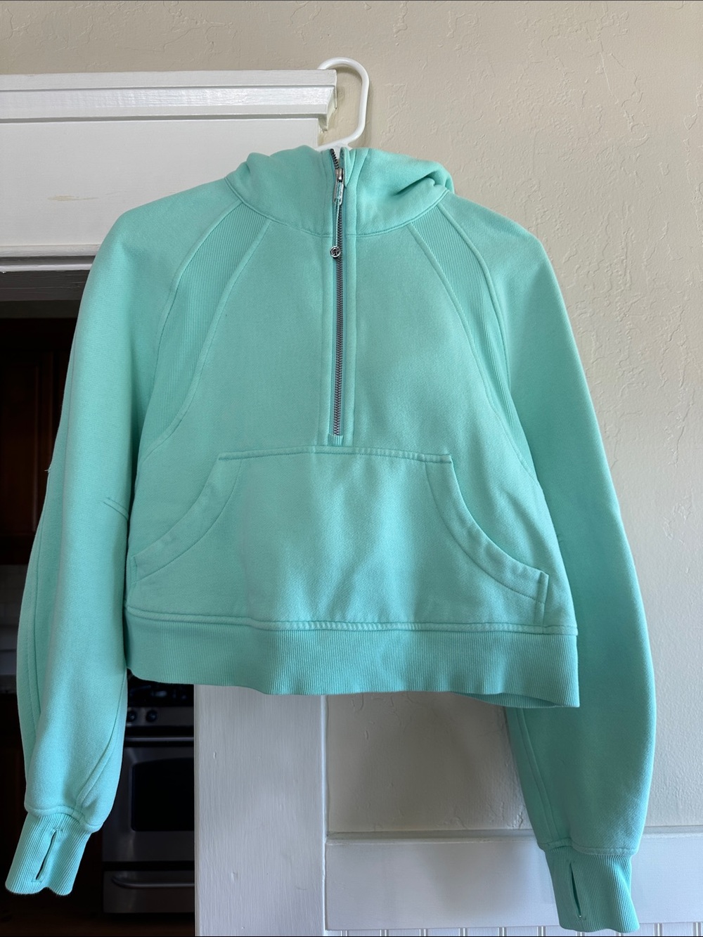 Lululemon Cropped Half-Zip Hooded Sweatshirt in Aqua green/blue. Size XS